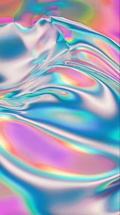 an image of colorful liquid flowing in the air