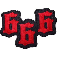 two black and red patches with the letter b on them