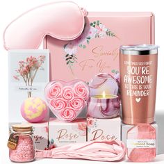 a pink gift box filled with lots of love and goodies for valentine's day