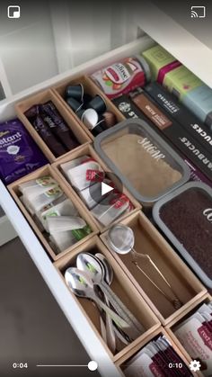 an open drawer filled with lots of different items