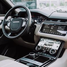 the interior of a modern car with electronic controls