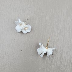 Earring Hand made Length 3cm Clay Porcelain Flower Dispatches from a small business in Canada White Pearl Flower Earrings For Formal Occasion, White Flower Bridal Earrings For Formal Occasions, Delicate White Jewelry For Bridesmaid Gift, White Bridal Earrings With Flower Shape For Formal Occasions, Flower-shaped Earrings For Wedding Gift, White Pearl Earrings With Flower Charm For Wedding, Elegant 3d Flowers Adjustable Earrings, Delicate White Pearl Earrings For Bridesmaids, White 3d Flower Formal Earrings