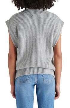 Combine sweater season with a summery day in a softly ribbed vest knit in a slouchy, relaxed fit. 26" length (size Medium) Front button closure V-neck 100% polyester Machine wash, dry flat Imported Vest Knit, Sweater Season, Sweater Vest, Steve Madden, Heather Grey, Nordstrom, Relaxed Fit, Size Medium, V Neck