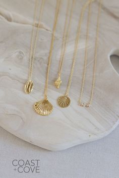 This beautiful Gold Sanibel Necklace is crafted from 14k gold vermeil and shaped like a flat scallop shell. Our gold jewelry pieces are durable and made to layer and stack. Style this as a simple everyday necklace, or layer it in a gold necklace stack. However you style it, this piece is a timeless reminder of the beauty of the ocean. Ocean-inspired Yellow Gold Jewelry, Elegant Jewelry With Oyster Bracelet, Ocean-inspired Gold Sterling Silver Jewelry, Ocean-inspired Gold Pendant Jewelry, Yellow Gold Shell-shaped Necklace Gift, Gold Ocean-inspired Pendant Jewelry, Dainty Yellow Gold Jewelry For Beach, Elegant Sterling Silver Shell Jewelry, Elegant Pendant Charm Necklaces For The Beach