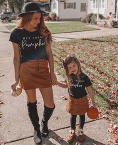 "I T E M D E S C R I P T I O N  * Material: 97% Cotton 3% Spandex * Color: Black * Vinyl design * Detail: Adult 5/8\" neck band. Kids Rib neck band * Unisex kids shirt  * Fit type: Women Fitted TTS (True to size)  S I Z I N G  Adult S (6-8): Length  26\" | Chest 17\" | Your Measurements: Bust 35-37\" | Waist 28-30\" | Hip 37-39\" M (10-12): Length 27.4\" | Chest 18.5\" | Your Measurements: Bust 38-40\" | Waist 31-33\" | Hip 40-42\" L (14-16): Length 28.5\" | Chest 20.4\" | Your Measurements: Bust 41-43\" | Waist 34-36\" | Hip 43-45\" XL (18-20): Length 29.4\" | Chest 22.4\" | Your Measurements: Bust 44-47\" | Waist 37-40\" | Hip 46-49\" *Length = Front Length High Point Shoulder  Kid 6-9 Months: Length: 13.2\" | Chest 10\"| Your Measurements: Weight 12-16 lbs. Length 23-27\" 12 Months: Len Hey There Pumpkin, Mommy And Me Shirt, Fall Shorts, Mommy And Me Outfits, Pumpkin Shirt, Thanksgiving Shirts, Hey There, Matching Shirts, Family Shirts