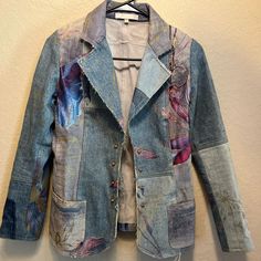 a jacket that has been altered to look like it is made out of old jeans