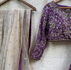 A three-piece aubergine lehenga set from the Priti Sahni collection. This georgette purple butti lehenga with gota work detail is paired with a dull gold blouse with bead and zardozi hand work embroidery. This outfit is completed with a nude dupatta in net material with sequin work. Silver Blouse Work, Purple Pre-draped Saree With Zari Work For Reception, Purple Saree With Gota Work, Purple Saree With Gota Work In Traditional Drape, Purple Semi-stitched Pre-draped Saree For Reception, Purple Mirror Work Pre-draped Saree For Wedding, Purple Pre-draped Saree With Dori Work For Diwali, Purple Pre-draped Saree With Mirror Work For Wedding, Wedding Purple Pre-draped Saree With Mirror Work