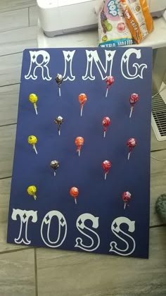 a blue sign that says prince and the boss with lollipops on it