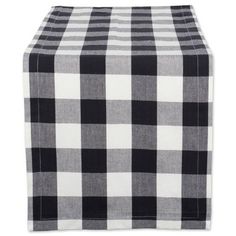 a black and white checkered table runner