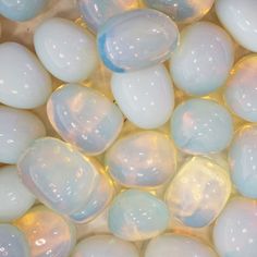 Discover the mystical powers of our Opalite Moonstone Tumbled Crystal. This radiant gem enhances your aura with healing energies and promotes inner peace and balance. Key Benefits: Aura Enhancement: Amplify your aura's vibrancy and clarity. Healing Properties: Harness healing energies for emotional and spiritual well-being. Inner Peace: Promote tranquility and harmony in your daily life. Why Choose Opalite Moonstone Tumbled Crystal? Natural Beauty: Each tumbled crystal is unique, showcasing opalite's shimmering hues. Versatile: Use for meditation, chakra balancing, or as a decorative piece. Quality Assured: Hand-selected for premium quality and energy. How to Use: Hold the crystal during meditation or place it in your living space. Carry it with you to benefit from its soothing energies th Crystals Manifestation, Opal Aesthetic, Crystals Moonstone, Moonstone Hair, Coding Images, Crystals Aesthetic, Opal Meaning, Pretty Crystals