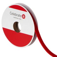 a red and white ribbon with the words celebrate it on it's end spool