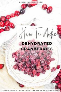 cranberries on a plate with text overlay how to make dehydrated cranberries