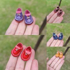 four pairs of baby shoes are shown in the palm of someone's left hand