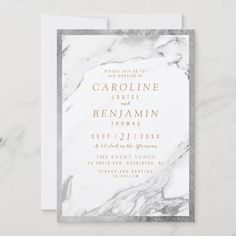 marble wedding card with gold foil on the front and white paper in the back that says,