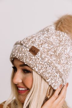 You are sure to be full of warmth when you top off your OOTD with this adorable mocha colored beanie featuring soft lightweight stretchy popcorn knit material with faux fur lining, wide rolled trim, and an accent pompom! Mocha Color, Impressions Online Boutique, Model Fits, Ear Warmers, Women Clothing Boutique, Knitting Materials, Knit Beanie, Online Womens Clothing, Popcorn