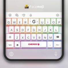 the keyboard on the phone is colorful and has an emoticive message that says cherry