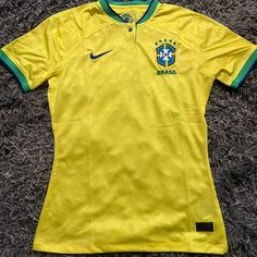 the soccer jersey is yellow and green