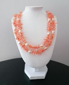 Handmade apricot-colored 2-row necklace made of coral and pearls. The approx. 51.5 cm long necklace is made of coral branches in apricot (approx. 8 mm - 15 mm) and freshwater pearls in very light apricot (approx. 9 mm - 13 mm). The chain clasp and an extension chain (approx. 5 cm) are in the color gold. The color, size and shape of the beads may vary. The colors of the beads may vary depending on camera and monitor settings. Available immediately. Combined shipping possible. If you purchase mult Light Apricot Color, Jewelry With Pearls, Necklace With Pearls, Apricot Color, Chakra Racine, Coral Necklace, New Energy, Long Necklace, Jewelry Set