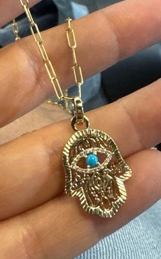 The Hannah Hamsa Charm Necklace to ward off evil with its pave diamond and turquoise center stone. You'll be protected in style! Hamsa Bracelet Gold, Hamsa Necklace Silver, Hamsa Necklace Gold, Opal Hamsa Necklace, Hamsa Jewelry, Rose Gold Charms, Hamsa Charm, Hamsa Necklace, Statement Drop Earrings