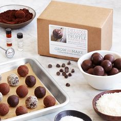 chocolate truffles and ingredients laid out on a table