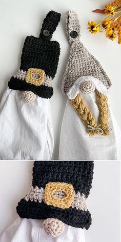 crocheted hats are on top of white towels and one has a black hat