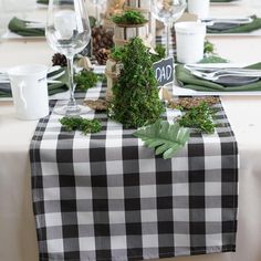 the table is set with place settings for dinner