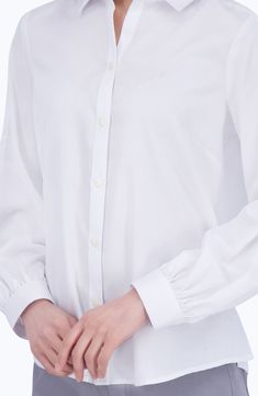 Gathers at the cuffs create light volume in the sleeves of this cotton-blend sateen button-up that's a versatile addition to your workplace wardrobe. 26" length (size Small) Front button closure Point collar Long sleeves with adjustable button cuffs 55% cotton, 45% polyester Hand wash, tumble dry Imported Classic Collared Blouse With Button Cuffs, Classic Shirt With Cuffed Sleeves For Work, Classic Collared Blouse With Cuffed Sleeves, Classic Blouse With Cuffed Sleeves For Work, Workwear Blouse With Cuffed Sleeves And Spread Collar, Classic Office Blouse With Button Cuffs, Classic Solid Blouse With Cuffed Sleeves, Timeless Long Sleeve Cotton Blouse, Classic Blouse With Hidden Button Closure For Daywear