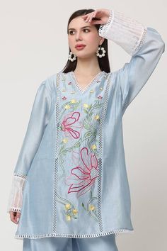 Blue kurta with floral thread embroidery embellished by pearl and scalloped lace. Comes with pant. - Aza Fashions Festive V-neck Dress With Resham Embroidery, Traditional Embroidered V-neck Dress For Eid, Embroidered V-neck Kurta For Eid, Eid Long Sleeve Sets With Embroidered Neckline, Spring V-neck Kaftan With Chikankari Embroidery, Eid Sets With Embroidered Neckline And Long Sleeves, Spring V-neck Chikankari Embroidered Top, Festive V-neck Kaftan With Intricate Embroidery, Long Sleeve Sets With Embroidered Neckline For Eid