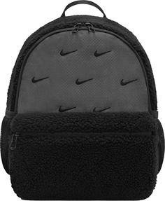 Don’t be fooled by its small size: this mini backpack is plenty spacious. From zip pockets and water bottle storage to comfy straps, it's perfect for daily adventures. Plus, the fuzzy sherpa exterior keeps you looking and feeling cozy even in colder temps. Fit & Design: Zippered main compartment keeps your stuff secure An internal pocket offers additional small-item storage Padded shoulder straps and back panel provide comfy carrying Additional Details: 13" H x 10" W x 5" D 11 L Spot clean Mochila Nike, Vera Bradley Backpack Campus, Nike Bags, Mini Mochila, Small Item Storage, Boys Backpacks, Bottle Storage, Nike Kids, Sandals Brands