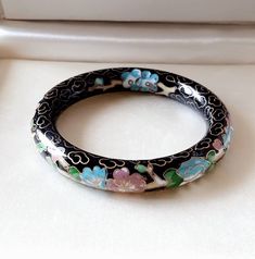 A beautifully made Asian Cloisonnè bangle bracelet made in enamel on brass in a pretty floral design with vibrant colours. Dated probably from 1920s due to its detailed workmanship. Inner diameter 2.56 inches. In very good vintage condition Vibrant Colours, Bangle Bracelet, Bracelet Making, Bangle Bracelets, Greece, Jewelry Bracelets, Floral Design, Vibrant Colors, Bangles