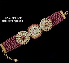 Enhance your accessory collection with this exquisite designer bracelet inspired by the renowned designer Sabyasachi. The bracelet is crafted with authentic moissanite stones and is perfect for adding glamour to any outfit. This jewellery set comes with a beautiful bracelet that is perfect for any occasion. The stones used in this bracelet are of high quality and are guaranteed to catch the eye. The bracelet is made from a durable material that will ensure it lasts for a long time. This set is p Elegant Bracelets With Intricate Design For Diwali, Elegant Adjustable Bangle For Diwali, Elegant Bangle Bracelet For Diwali, Luxury Gold Bangle For Festive Occasions, Elegant Adjustable Kundan Bangle, Temple Jewelry Bracelets With Stone Work For Celebrations, Temple Jewelry Bracelets For Celebration With Stone Work, Elegant Bracelets For Diwali Celebration, Elegant Bracelet For Diwali Celebration