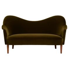 a brown couch sitting on top of a wooden frame