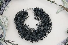 Black onyx necklace, Gothic bridal necklace, Jet black necklace, Air necklace, Thick necklace, Crocheted necklace, Black gift for girlfriend. Black gothic style necklace with onyx chips and glass seed beads. A dark, gothic and flexible piece of jewelry, it will be a great addition to an evening or a special occasion gown. This necklace are not so logn and you can use it like multistrand choker. It might be a perfect gift for her for a birthday, anniversary or another occasion. Measure: length (f Black Pendant Chain Necklace Gift, Black Beaded Choker For Jewelry Making, Black Choker Necklace For Evening, Handmade Black Onyx Beaded Necklaces, Black Handmade Beaded Necklaces For Evening, Handmade Black Chain Necklace For Party, Elegant Handmade Black Chain Necklace, Black Crystal Long Necklace For Jewelry Making, Handmade Black Onyx Crystal Necklaces