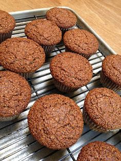 several muffins cooling on a wire rack