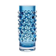 a blue glass vase filled with lots of bubbles