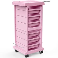 a pink cart with many trays on it