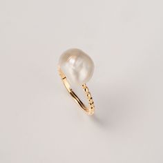 This is stackable dainty ring is perfect for daily wear. The ring is available in two colors, white and purple (both natural colors). Every pearl is designed by mother nature and one of a kind. So you won't find another bracelet that looks the same. This ring is designed and handmade with enthusiasm by myself. 🤍  MATERIAL 🤍 - Pearl: Freshwater Keshi pearls, AAA luster - Ring Band: 925 Silver or 925 Silver in Gold 🤍  WHAT IS KESHI PEARL 🤍 Keshi pearls have no nucleus, the pearls are composed Elegant Everyday Pearl Open Ring, Classic White Midi Rings For Everyday, White Classic Adjustable Midi Rings, Elegant Stackable Rose Gold Pearl Ring, Minimalist Open Ring In Pearl White, Elegant Everyday Stackable Pearl Ring, Elegant Rose Gold Stackable Pearl Ring, Classic White Open Midi Rings, Elegant Adjustable Stackable Midi Rings