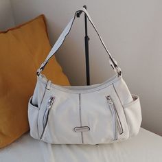 100%Leather handbagimportedinside zippered pockets with multiple open pocketsmultiple outside zippered pockets with dual side pockets White Hobo Bag With Zipper And Double Handle, White Leather Bags With Pockets, White Double Handle Hobo Bag With Zipper, White Leather Hobo Bag With Zipper Closure, Purse White, Coach Jewelry, Etienne Aigner, Leather Shoulder Bag, Jewelry Shop