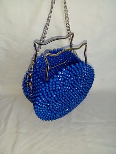 ✨ Add a touch of sparkle to your look with this luxurious beaded bag! 💎 Perfect for shining on any occasion.

Ready to shine? 🌟
Order yours now !
#Fashion #Luxury #BeadedBag Summer Party Beaded Bag, Summer Party Beaded Bags, Embellished Evening Bag For Summer, Embellished Evening Bags For Summer, Handmade Evening Clutch For Summer, Summer Party Evening Bag With Pearl Handle, Handmade Clutch For Summer Evenings, Summer Evening Bag With Chain Strap, Handmade Summer Evening Clutch