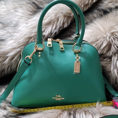 No Low Balling, Make Resonable Offers Only Coach (2553) Katy Satchel Handbag Brand New With Tags! 100% Authentic! Features: Detachable/Adjustable Crossbody Strap Inner Zip Pocket Outer Zip Pocket Zip Top Closure Color: Bright Jade Material: Crossgrain Leather Measures: 11.75" L X 4" W X 7.75" H Msrp: $350.00 Green Handheld Satchel With Gold-tone Hardware, Coach Green Satchel For Shopping, Green Coach Satchel For Shopping, Elegant Green Coach Satchel, Coach Green Top Handle Satchel, Green Coach Top Handle Satchel, Green Coach Satchel With Handles, Coach Green Satchel Bag, Formal Green Coach Bag