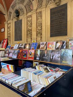 many books are on display in a room