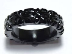 Buyer will receive 1 Piece Natural Black Obsidian Carved Band/ you will really love it.you will gift it to your love ones and friends. Product Details Product Name - Natural Black Obsidian Carved Band Gemstone - Natural Black Obsidian Quantity - 1 Piece ----------------------------------------------------------------------------- THIS BEAUTIFUL ITEM IS AVAILABLE ONLY ON ETSY ------------------------------------------------------------------------------------ Note - Kindly choose your required ri Black Carved Round Rings, Carved Black Rings As Gift, Carved Black Rings For Gift, Black Carved Ring Jewelry, Black Carved Round Jewelry, Black Obsidian Ring, Engagement Ring Band, Obsidian Ring, Jewelry Christmas