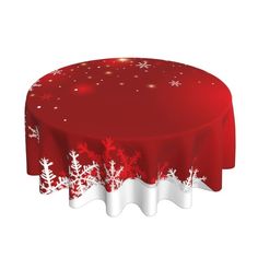 a red table cloth with white snowflakes and stars on the top is shown