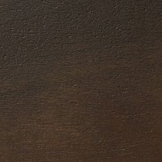 an image of a brown surface that looks like it has been painted