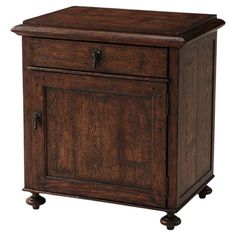 a small wooden cabinet with wheels on the bottom and one door open to reveal a drawer