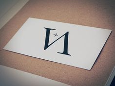 a close up of a paper with the letter n on it