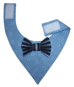 a blue bandana with a black bow tie on it's collar and tag