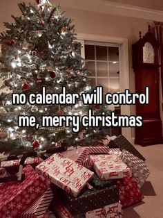 a christmas tree with presents under it and the words no calendar will control me, merry christmas