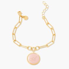 Bold and beautiful, this personalized enamel initial charm bracelet makes a statement with any outfit. Available in three stunning colors, the enamel is personalized with your or a special someone’s initial. The charm hangs elegantly from a modern, elongated link chain. Give as a gift or treat yourself! Available in 14k gold plated brass Enamel filled pendant measures 5/8" 6" elongated link chain with 1" extender Lobster claw closure With engraving this item is FINAL SALE SKU: BYB1106 Personalized Enamel Jewelry For Everyday, Everyday Personalized Enamel Jewelry, Initials Charm Bracelet Gift, Elegant Personalized Enamel Jewelry, Trendy Monogrammed Jewelry For Personalized Gifts, Trendy Monogram Jewelry For Personalized Gifts, Luxury Elegant Enamel Bracelets, Enamel Gold Jewelry With Initials, Gold Enamel Bracelet With Charms