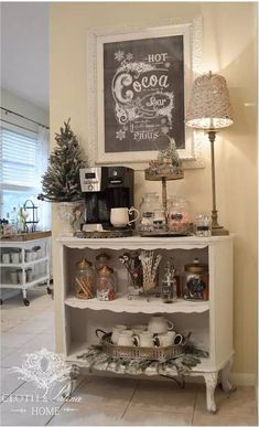 a coffee bar is decorated for christmas with chalkboard on the wall and other items